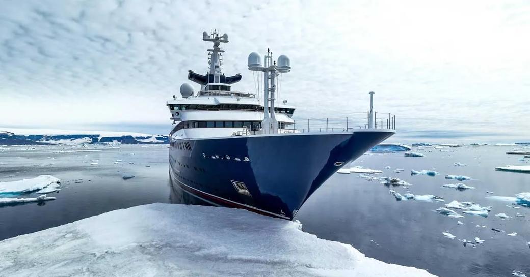 Superyacht charter OCTOPUS at anchor, surrounded by ice