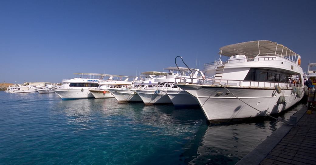 Motor yacht charters berthed