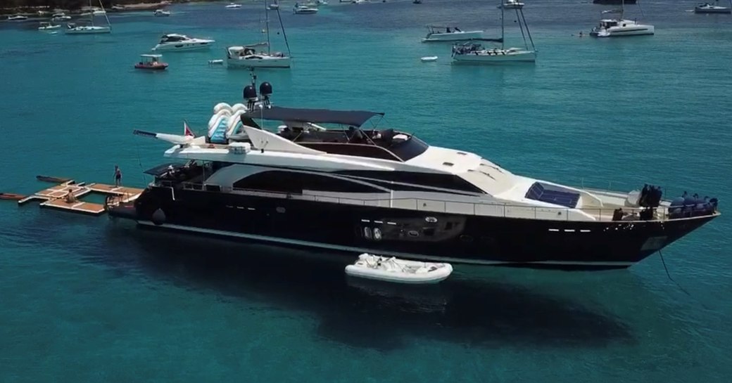 Charter yacht LADY AMANDA at anchor with water toys deployed