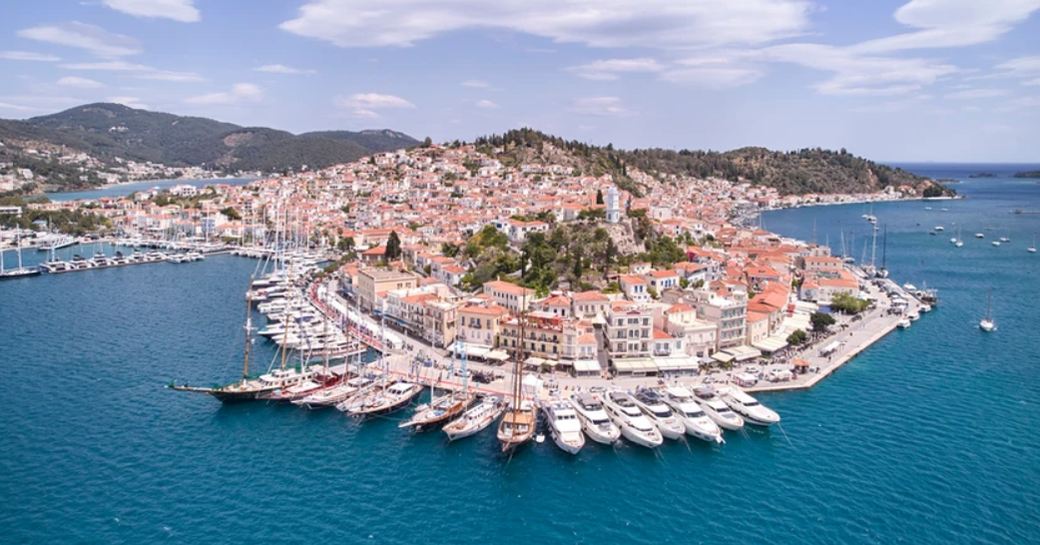 Aerial view of Poros Port, Greece, with luxury yacht charters berthed