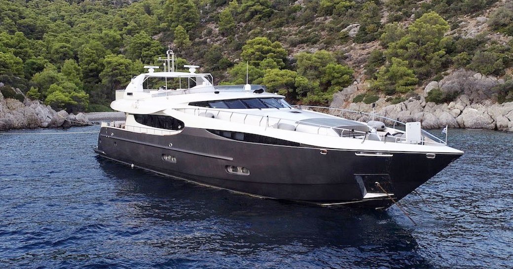 Charter yacht SANJANA at anchor in a bay