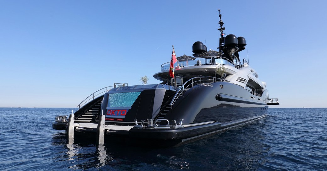 aft view of superyacht OKTO with infinity swimming pool