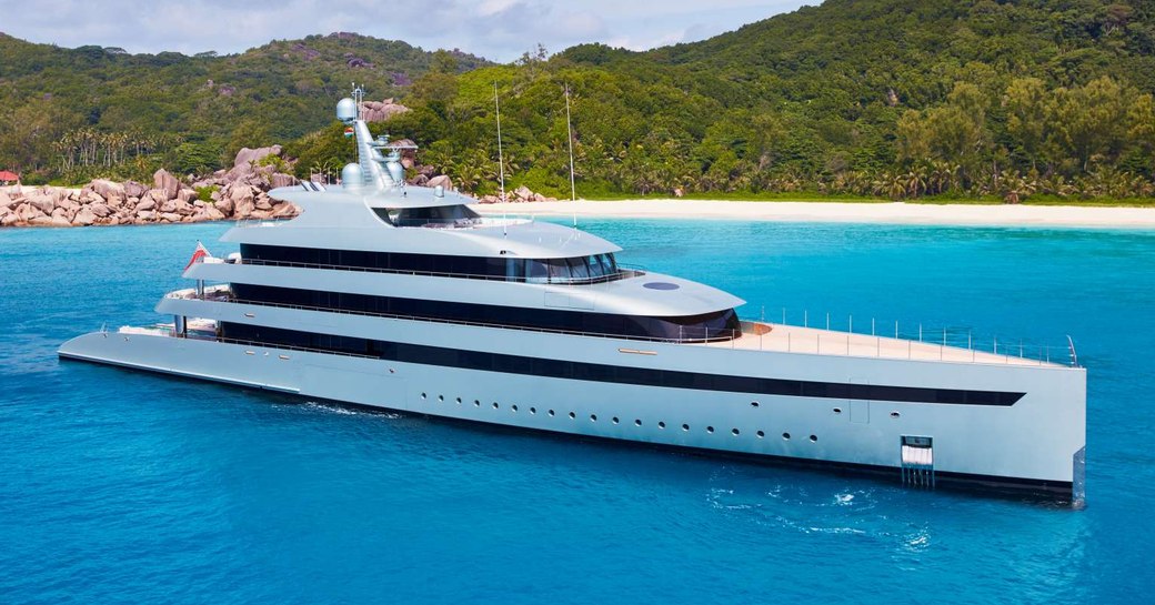 Charter yacht SAVANNAH at anchor in a bay.