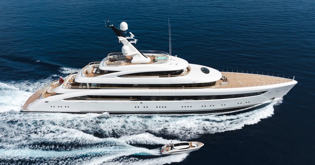 Charter yacht ALVIA at sea with tenders