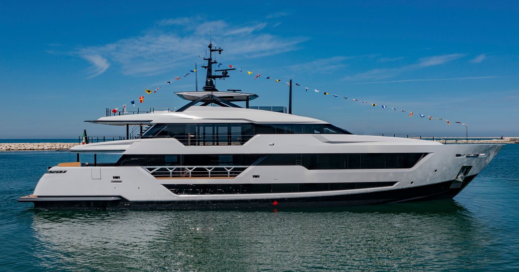 Charter yacht FIFI at anchor with flags