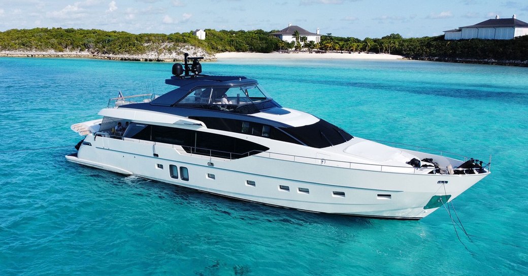 Charter yacht C-DAZE at anchor with an island in the background