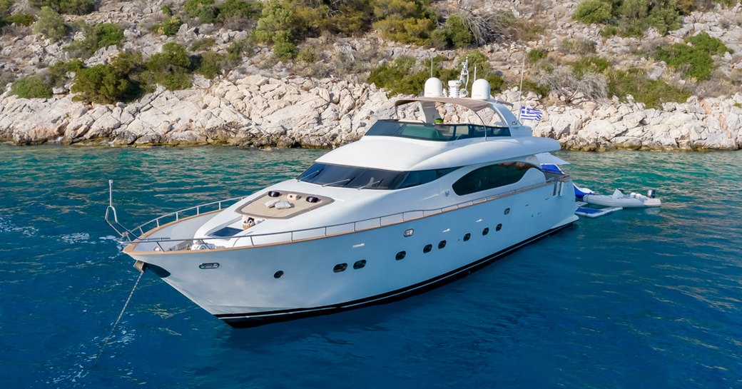 Charter yacht COOKIE at anchor in a bay