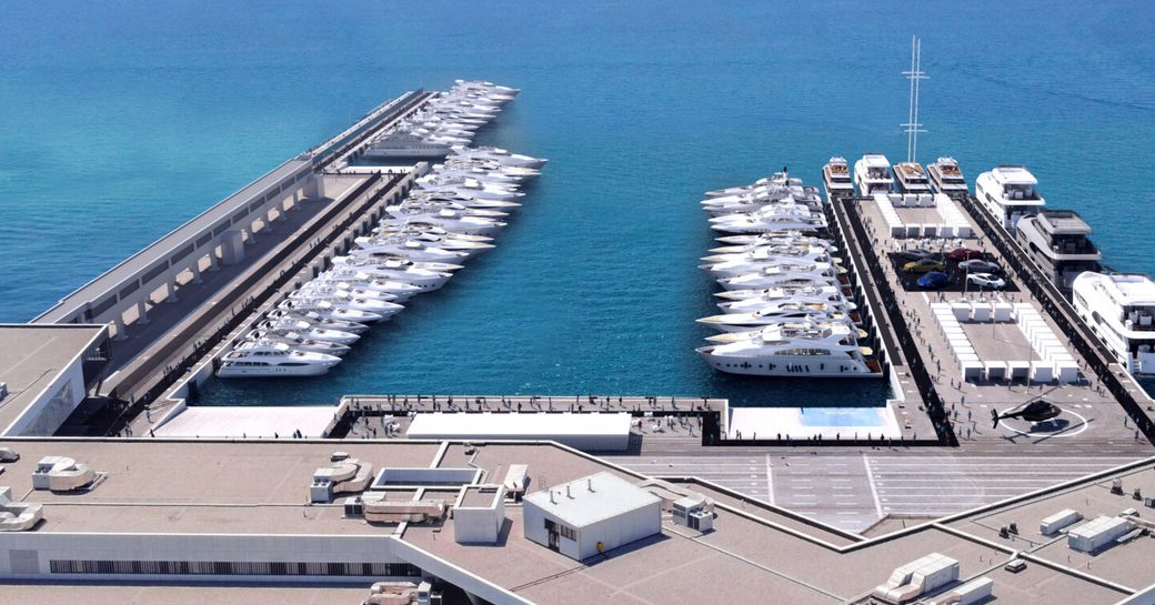 Elevated view looking down on multiple superyacht charters berthed in Zadar Cruise Port