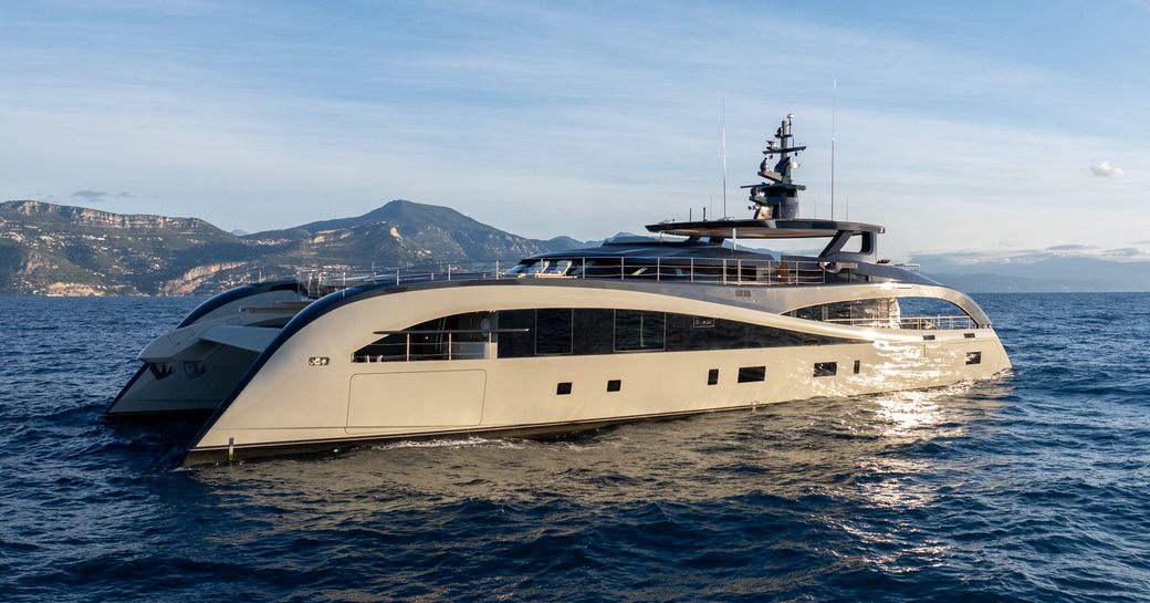 Charter yacht SEAWOLF X at anchor surrounded by sea
