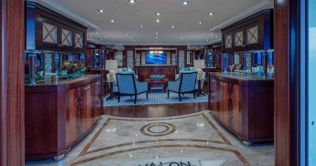 marble-floored entryway of main salon aboard luxury yacht AVALON with lounge in background