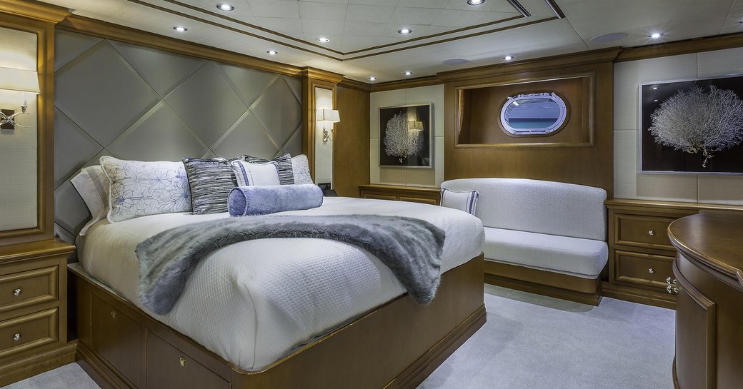 Double bed and sofa on on superyacht M3