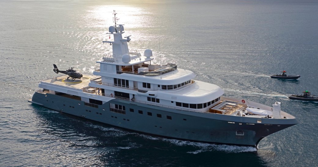 Charter yacht PLANET NINE at sea with two tenders alongside