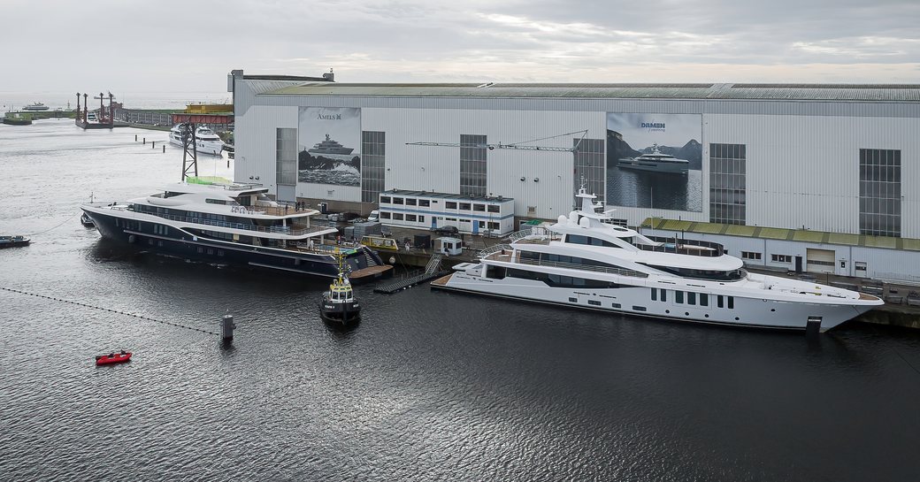 An Amels Limited Editions 200 and 242 being launched at Damen Yachting facility