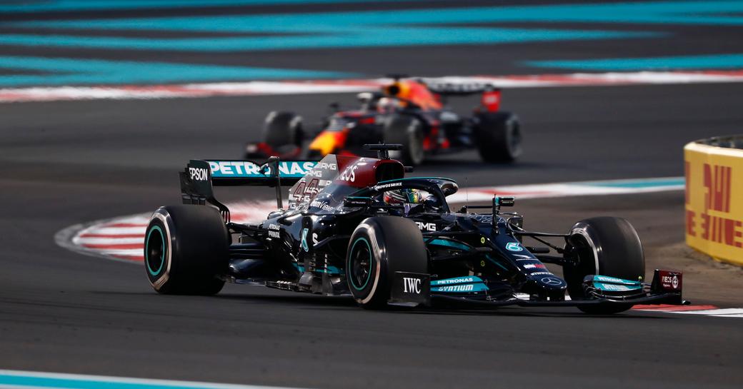 F1 racer in action on Yas Marina Circuit