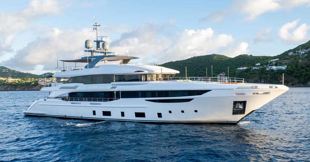 Charter yacht WATERCOLOURS at anchor in a bay
