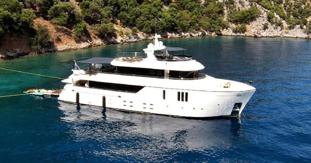 Charter yacht ZEEMAR at anchor in a scenic bay