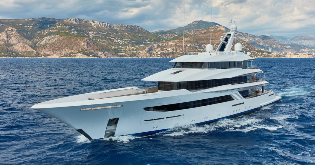 superyacht JOY cuts through the water on a luxury yacht charter in the Mediterranean
