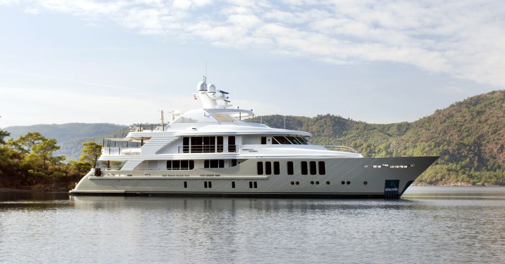 motor yacht Orient Star docked in an idyllic anchorage on a charter vacation in Turkey