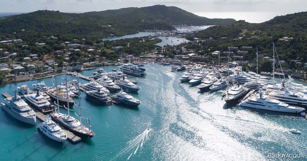 Aerial view looking down over charter yachts berthed in Antigua