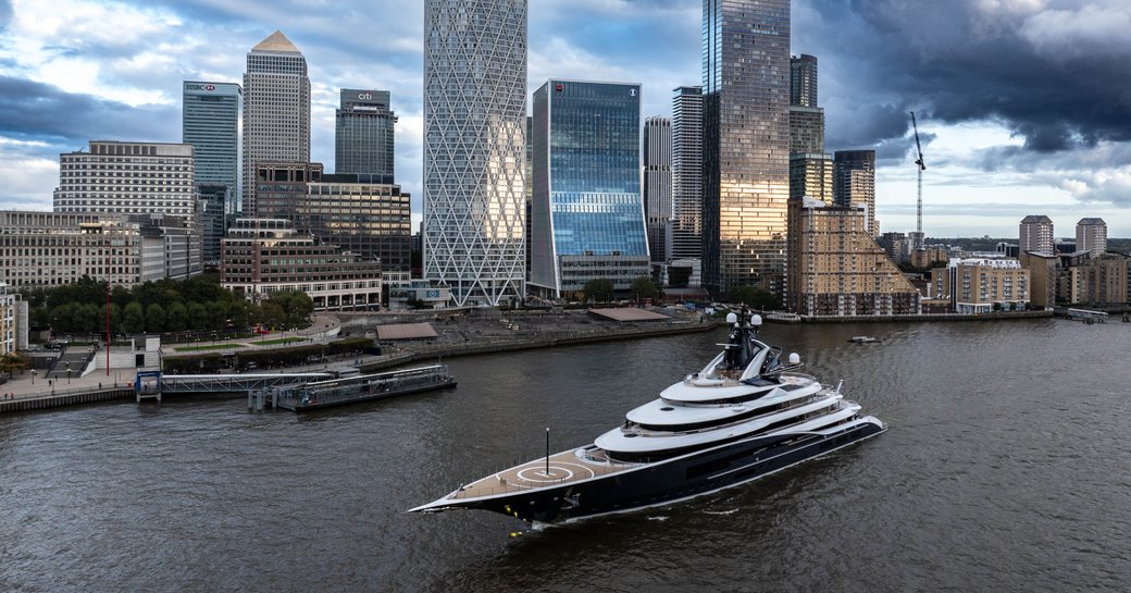 Superyacht charter KISMET underway in front of Canary Wharf London