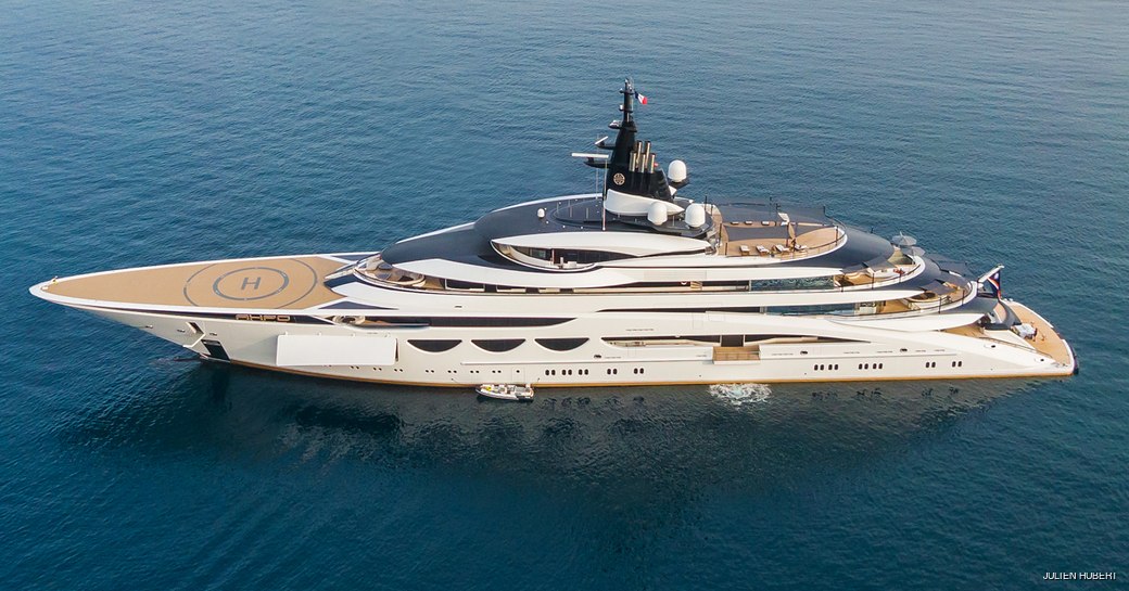 Charter yacht AHPO at anchor, surrounded by sea