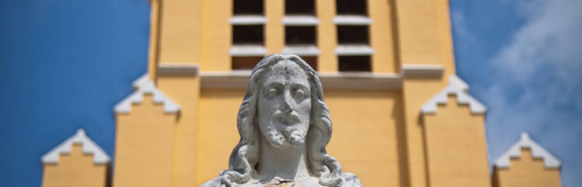 Statue of Jesus Christ and Church