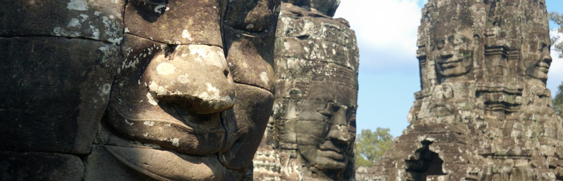 Sculptures of faces in the Temple of Bayon