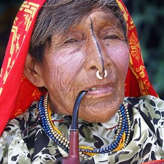 Old Indian woman in a traditional costume and jewellery 