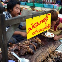 Food stall with beef and pig giblets, entrails in Myanmar