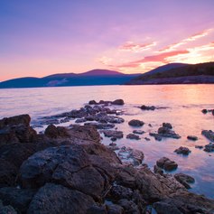 Sun Sets Behind the Mountains of Montenegro