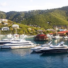 Superyachts lined-up in the port of St. Thomas