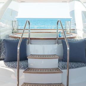 Steps leading up to an on-deck Jacuzzi onboard charter yacht MISS STEPHANIE.