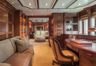 Charter yacht NOMAD private owner's study with desk and sofa
