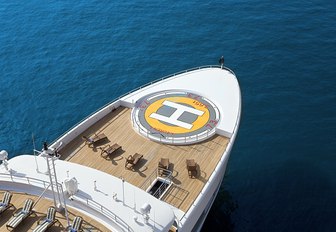 A helipad marked on the bow of a superyacht, as seen from above