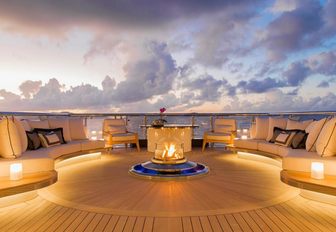 The fire pit included on the sun deck of luxury yacht KISMET