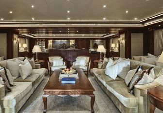 main salon styled with an American classic theme on board motor yacht Areti 