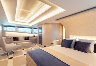 Cream styling in master suite of charter yacht Philmi with skylight