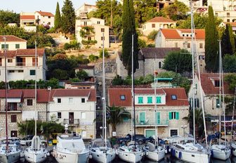 Yachts lined up in the fishing village of Stomorska, Solta