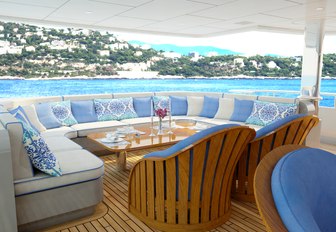 U-shaped seating area on the main deck aft of motor yacht My Seanna