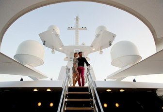 Charterers enjoying the view from the exterior of M/Y AXIOMA