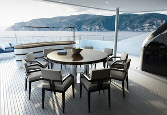 the alfresco dining area and cocktail bar on the upper aft deck of crewed yacht SOARING