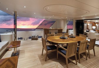 alfresco dining table on the aft deck of luxury yacht Far Niente