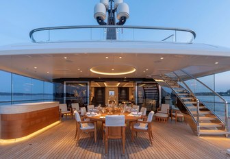 luxury yacht hasna alfresco dining area with shade 