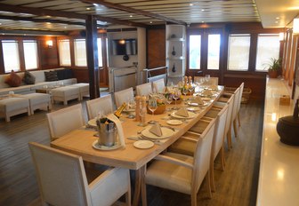 LAMIMA yacht interior dining in the main salon 