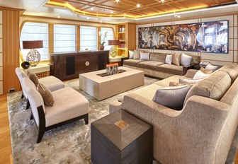 stylish main salon with modern art aboard charter yacht HANIKON 