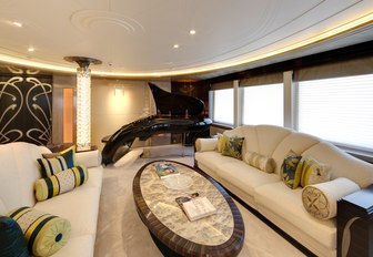 schimmel Pegasus piano with sofas in the piano lounge aboard motor yacht AMARYLLIS  