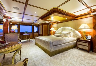 master suite with large bed and opulent styling on board motor yacht My Seanna