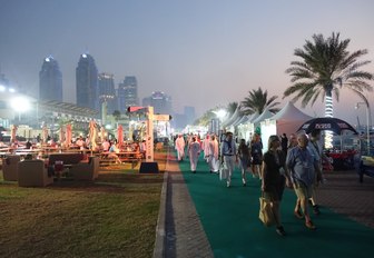 visitors flock to the Dubai International Boat Show 2017 as the sun begins to set