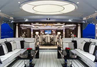 chic alfresco lounge on aft deck of luxury yacht OKTO