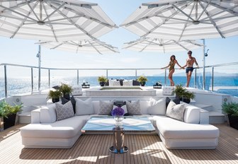 raised spa pool and seating area on the sundeck of luxury yacht 11/11 